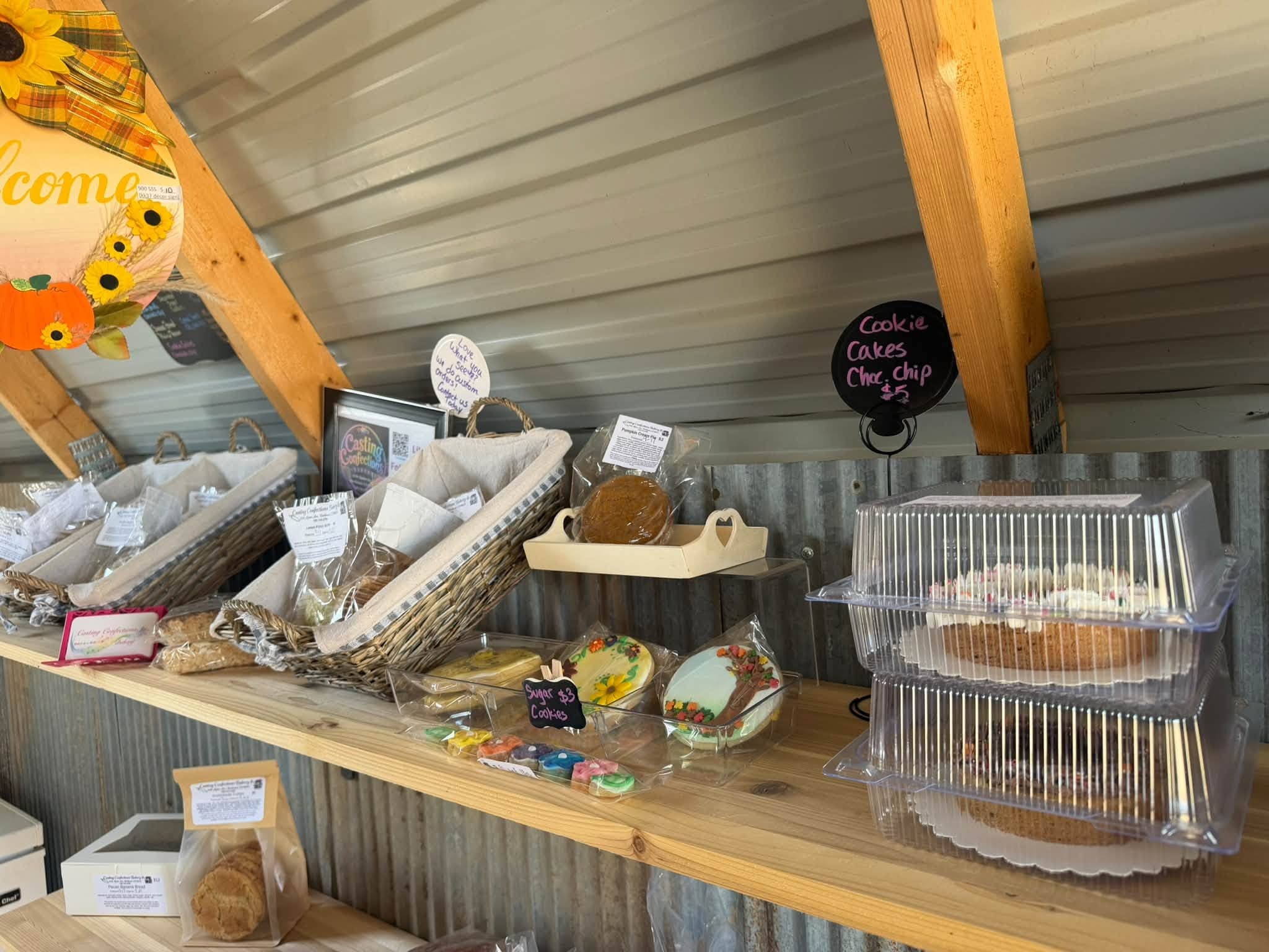 Counter with baskets of eggs, cookies, and cookie cakes